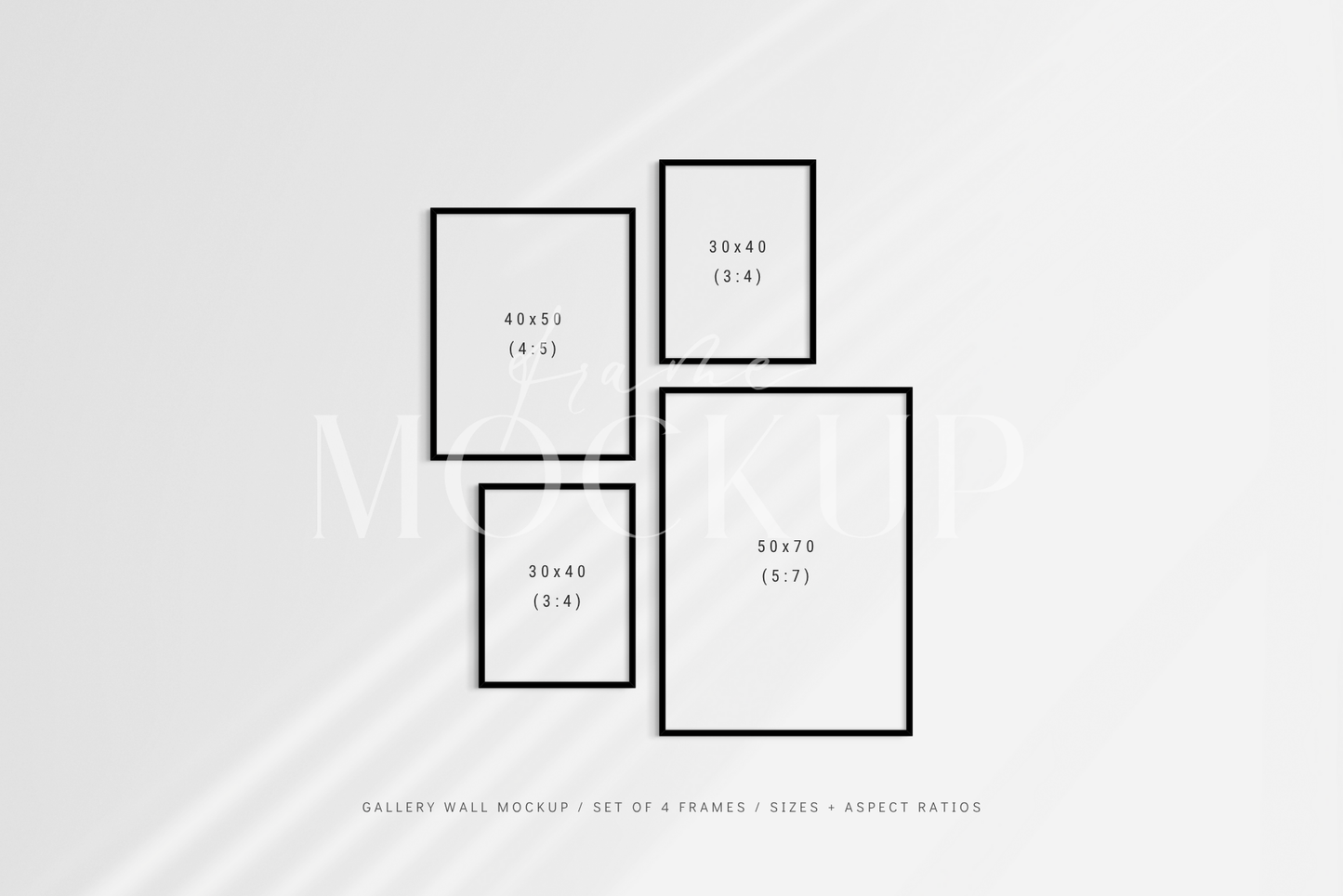 Gallery wall mockup set of 4 customizable black frames with shadow overlays.