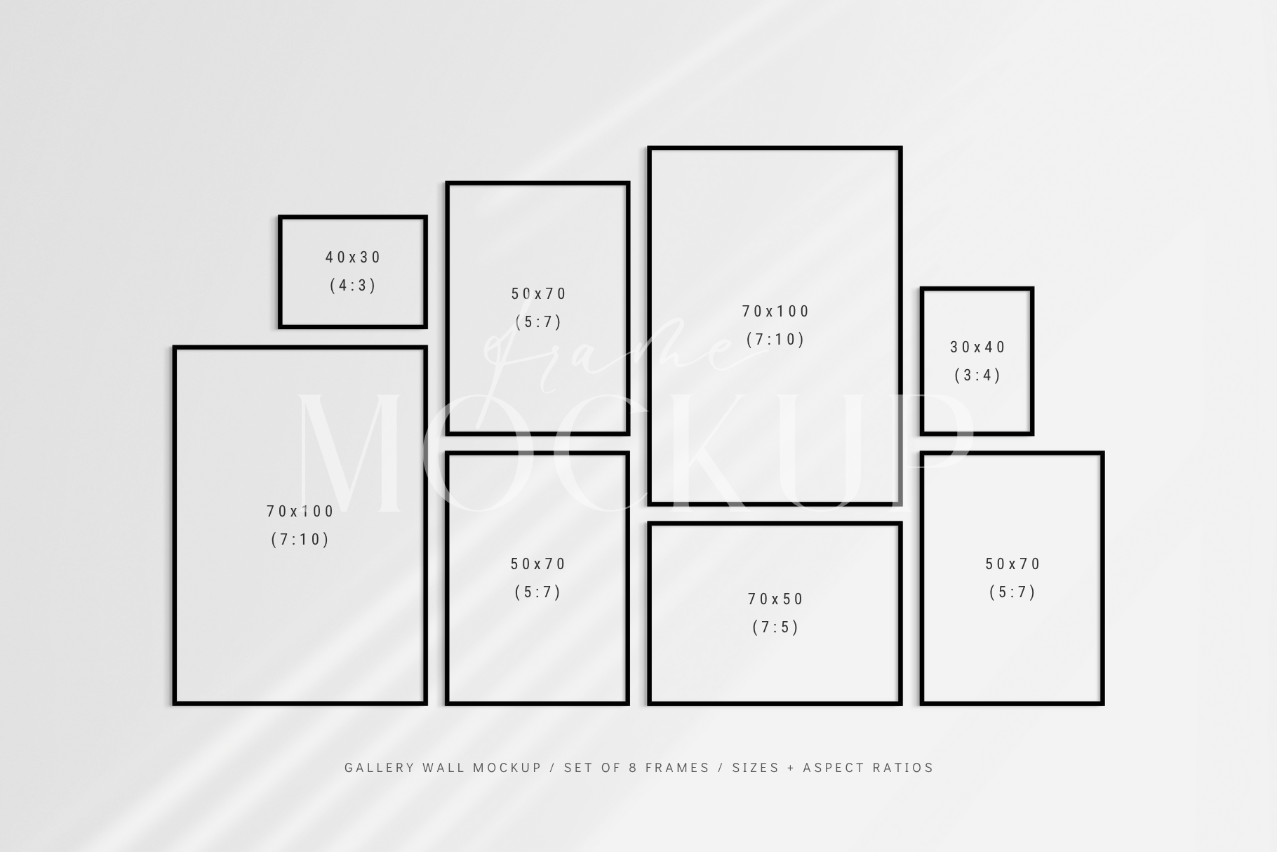 Gallery wall mockup set of 8 customizable black frames with shadow overlays.