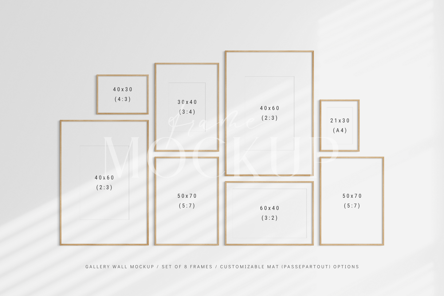 Customizable gallery wall frame mockup kit with eight vertical and horizontal frames.
