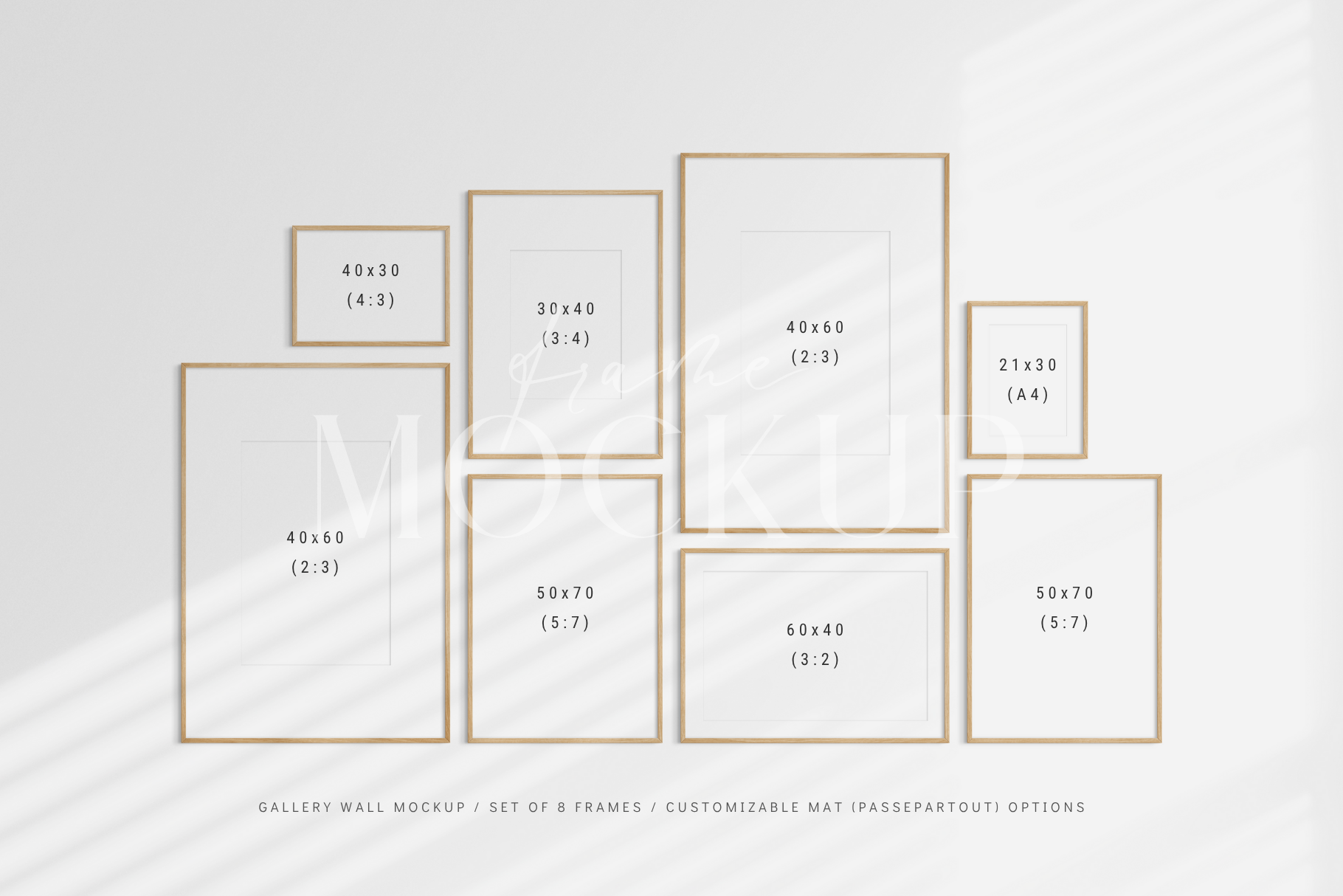 Customizable gallery wall frame mockup kit with eight vertical and horizontal frames.