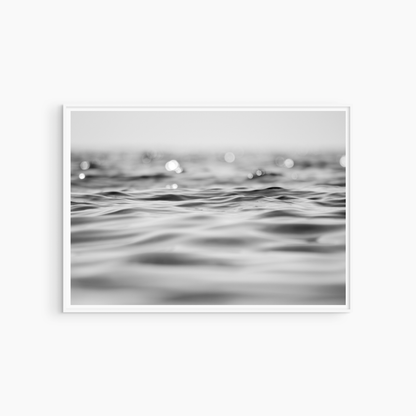 Black and white ocean surface photography print, minimalist coastal wall art, shimmering sea and horizon