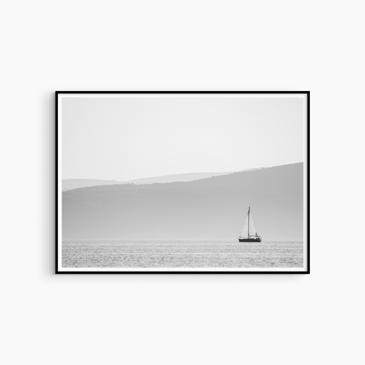 Black and white sailboat photography print, minimalist nautical wall art, misty sea and islands print