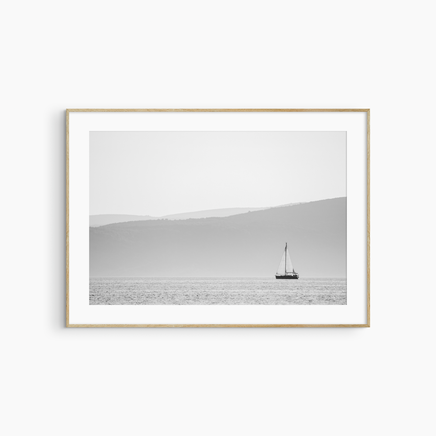 Printable sailboat photography, black and white coastal seascape wall art, lone sailboat print