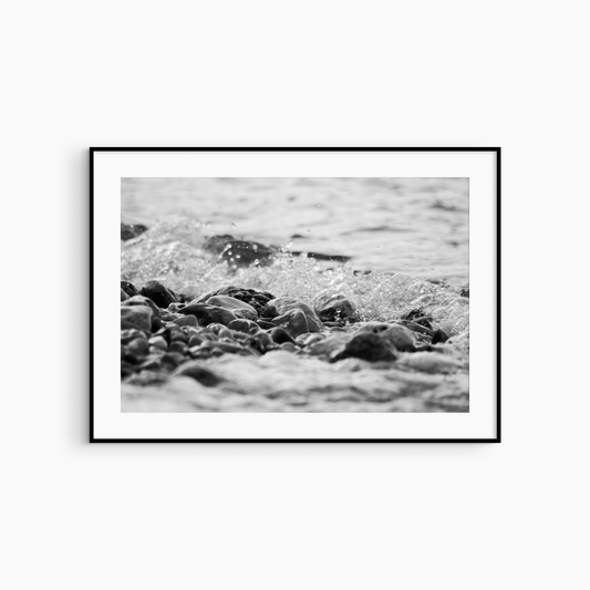 Pebble beach and wave photography print, black and white coastal wall art, rocky shore printable