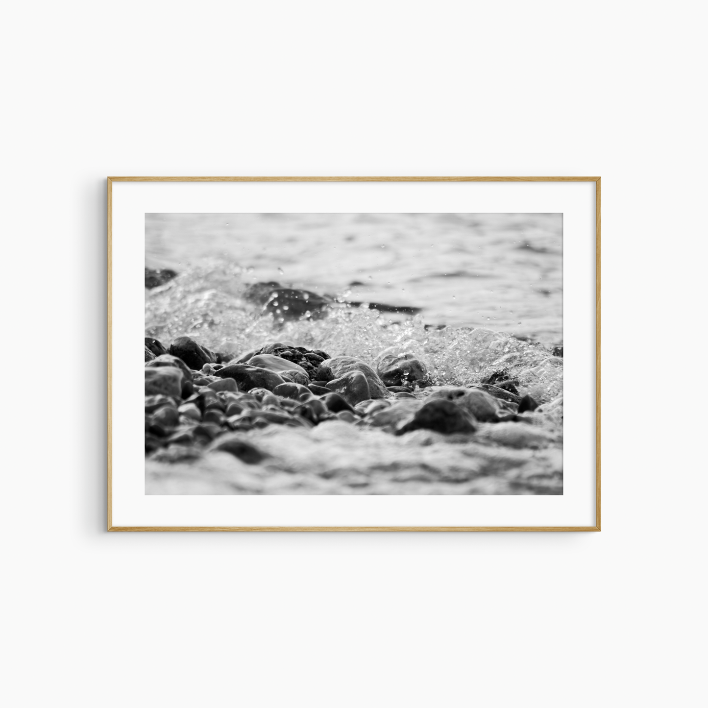 Black and white pebble shore photography print, rocky beach coastal wall art, wave and stones print