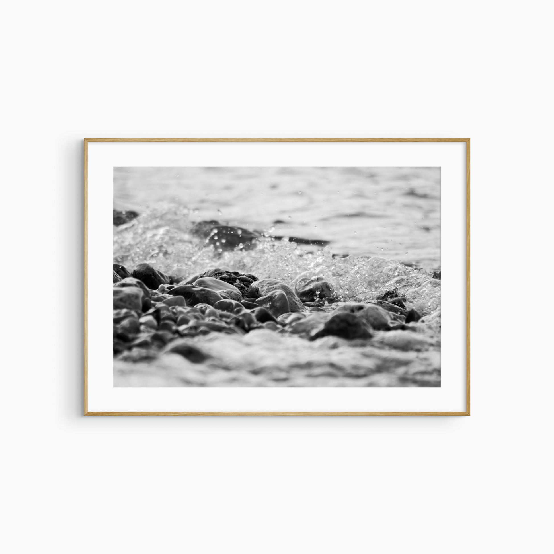 Black and white pebble shore photography print, rocky beach coastal wall art, wave and stones print