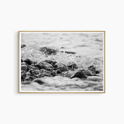 Printable rocky shore photography, black and white pebble beach wall art, wave crashing on rocks print