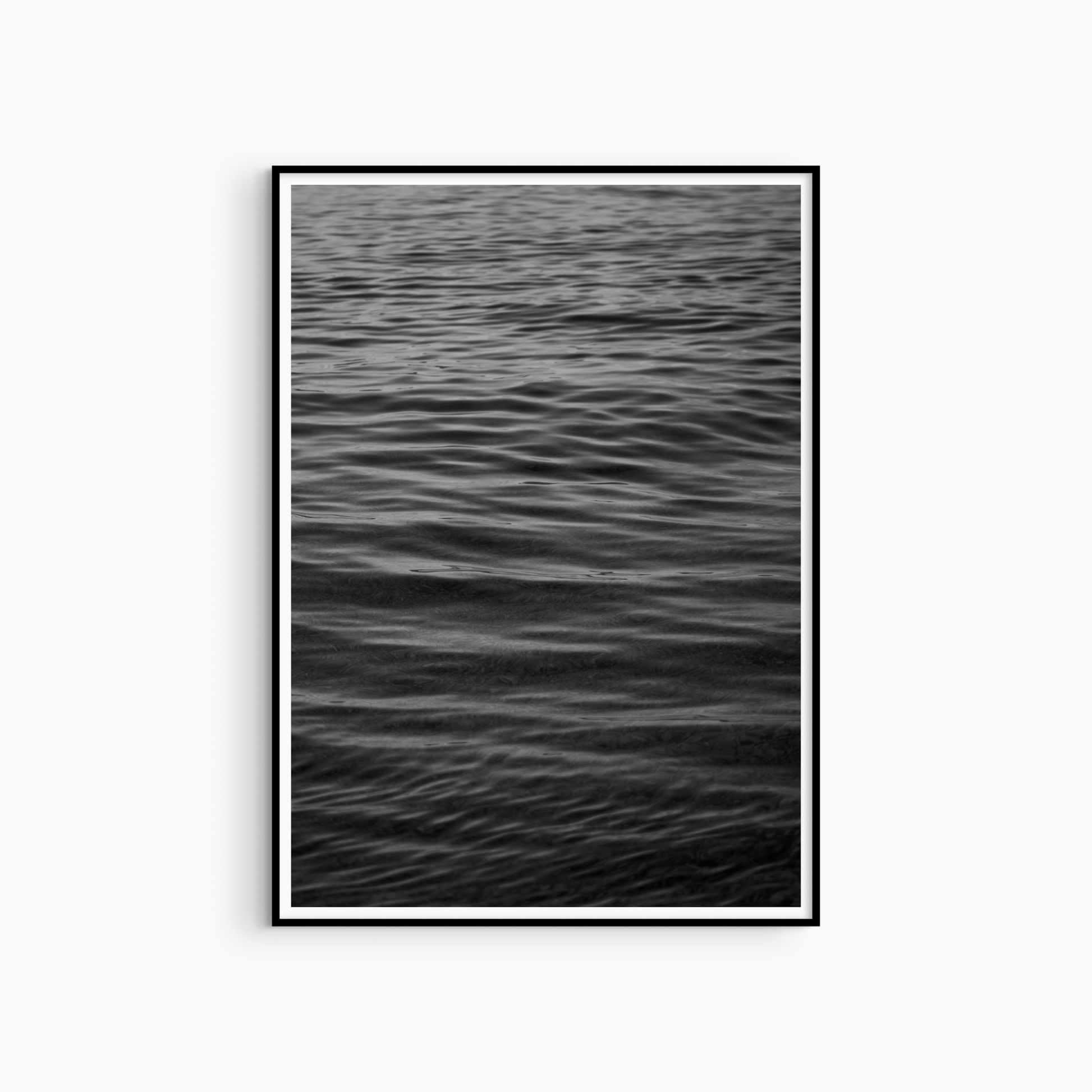 Dark black and white ocean surface photography print, minimalist sea wall art, ripple texture print
