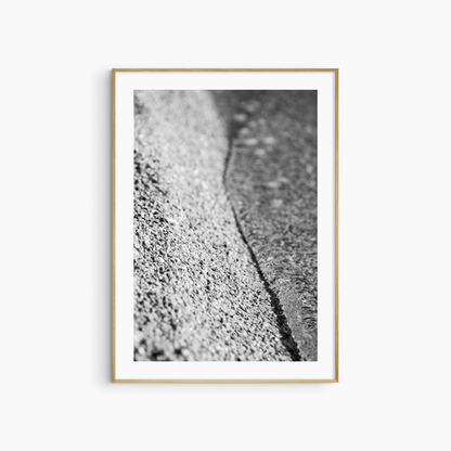 Black and white pebble shore photography print, abstract beach texture wall art, coastal gravel print