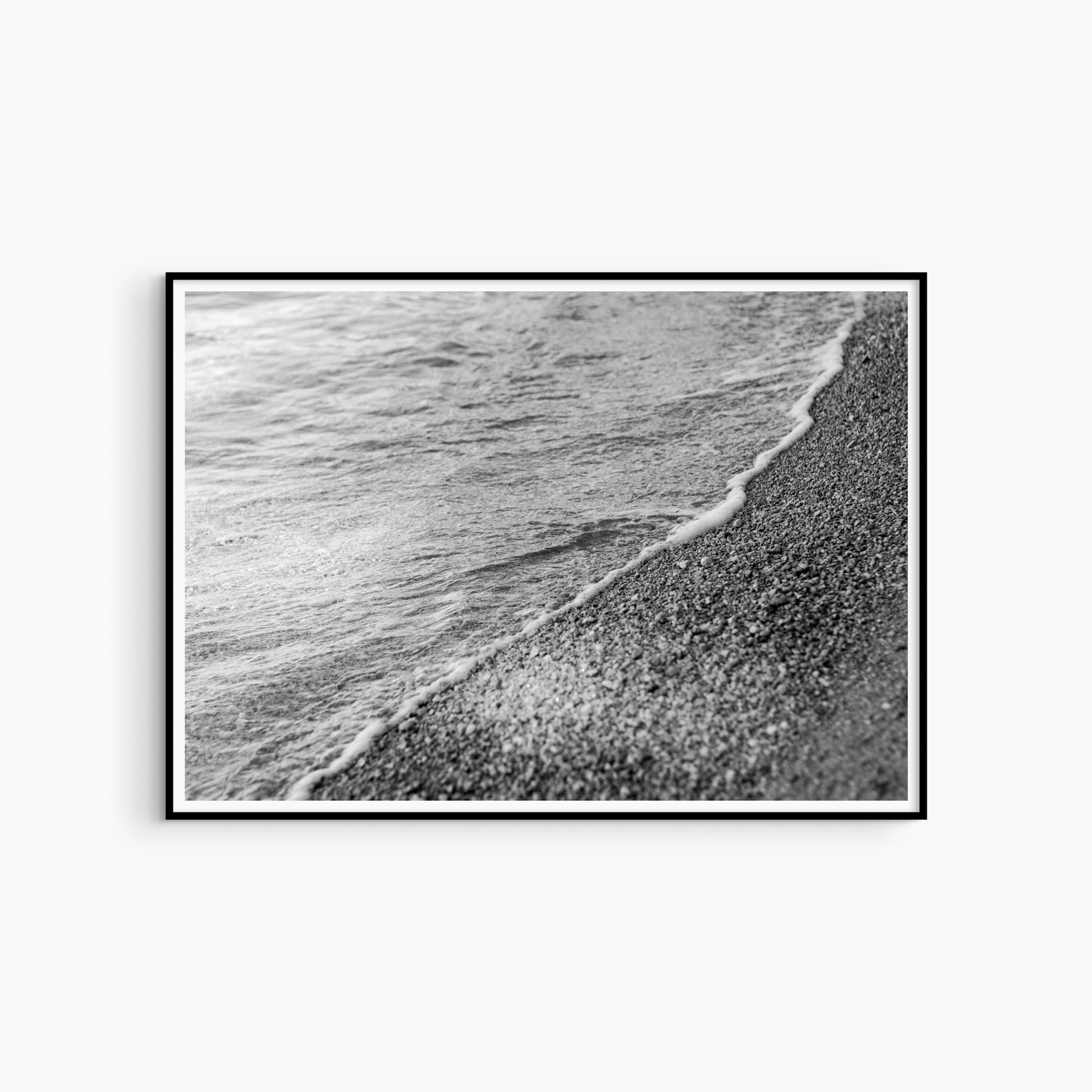 Black and white shoreline photography print, pebble beach coastal wall art, foam edge and pebble shore print