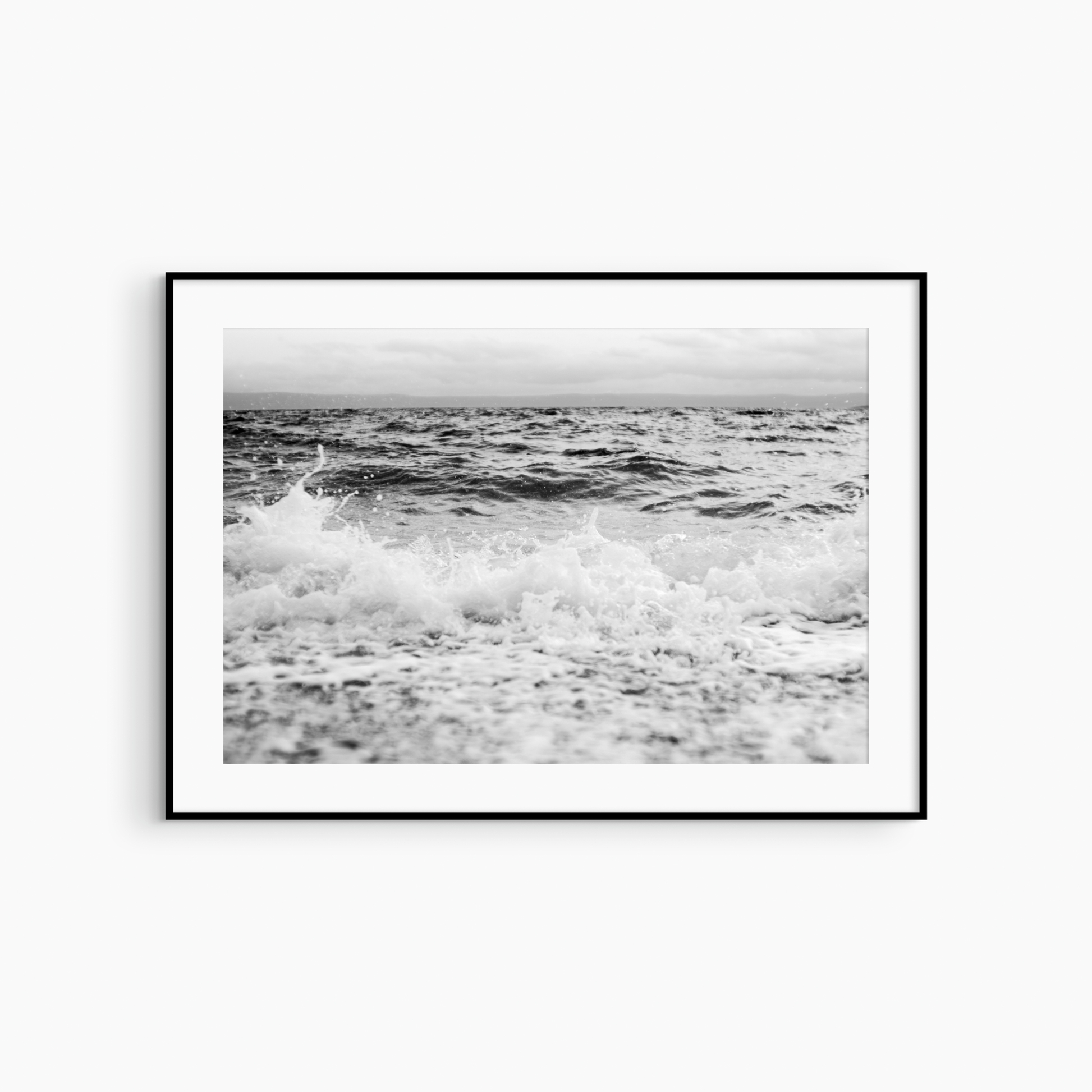 Low angle wave and sea photography print, black and white coastal wall art, stormy horizon print