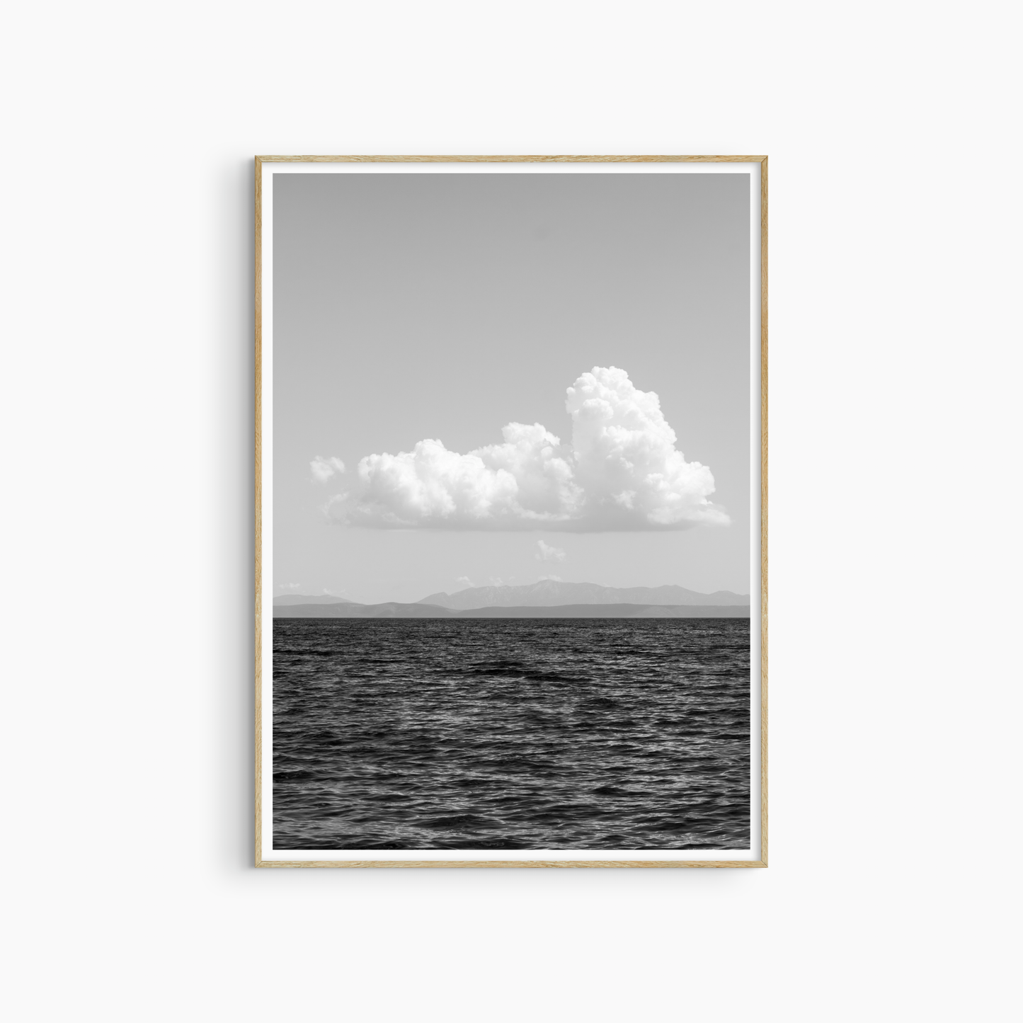 White cloud over open sea photography print, black and white coastal wall art, sky seascape print