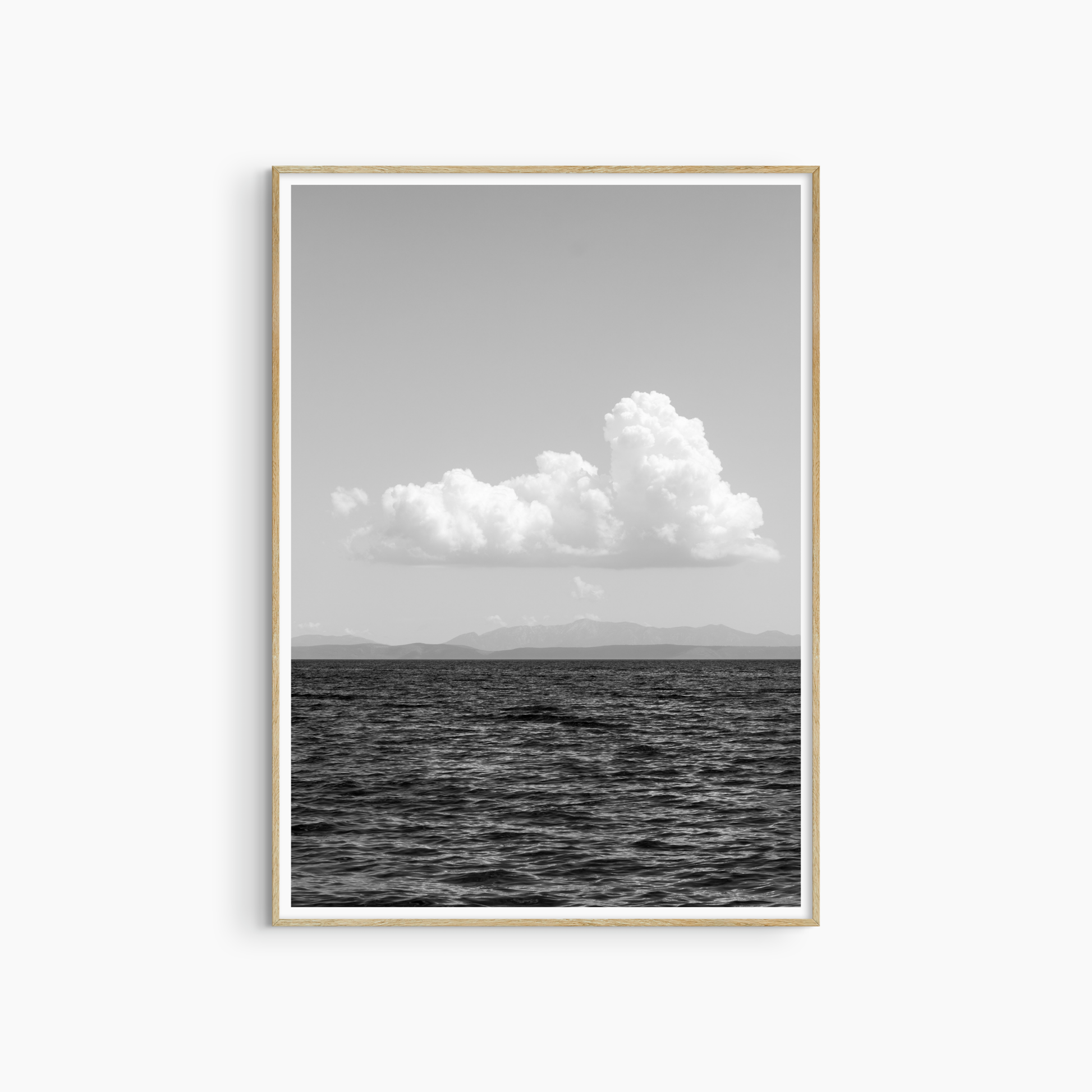 White cloud over open sea photography print, black and white coastal wall art, sky seascape print