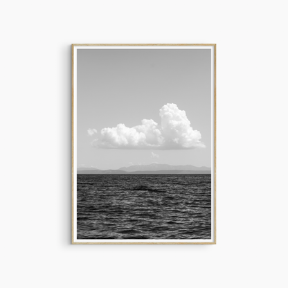 White cloud over open sea photography print, black and white coastal wall art, sky seascape print