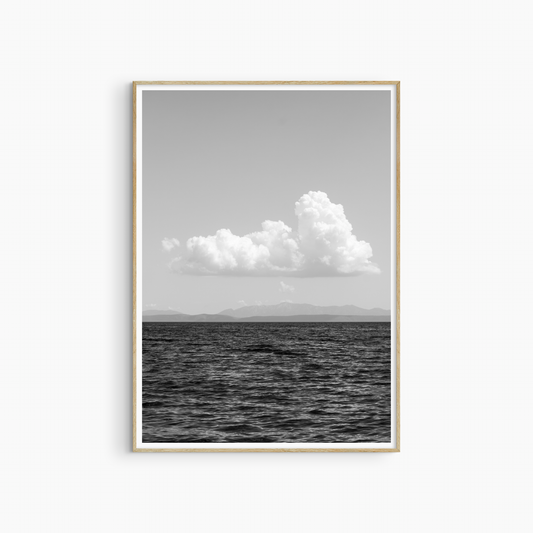 White cloud over open sea photography print, black and white coastal wall art, sky seascape print