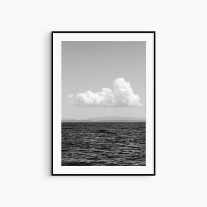 Black and white cloud over sea photography print, dramatic sky seascape wall art, minimalist cloud print