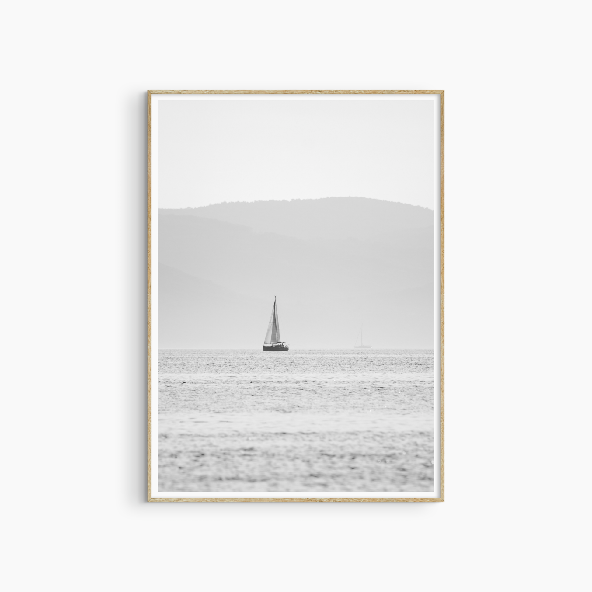 Minimalist sailboat photography printable, black and white luminous sea wall art, calm coastal print