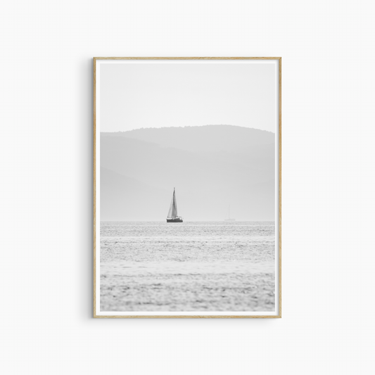 Minimalist sailboat photography printable, black and white luminous sea wall art, calm coastal print