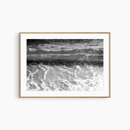 Black and white wave on pebble shore photography print, dramatic coastal wall art print