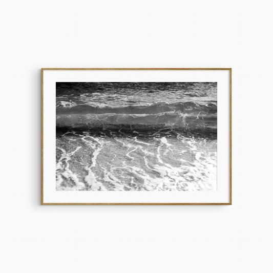 Black and white wave on pebble shore photography print, dramatic coastal wall art print