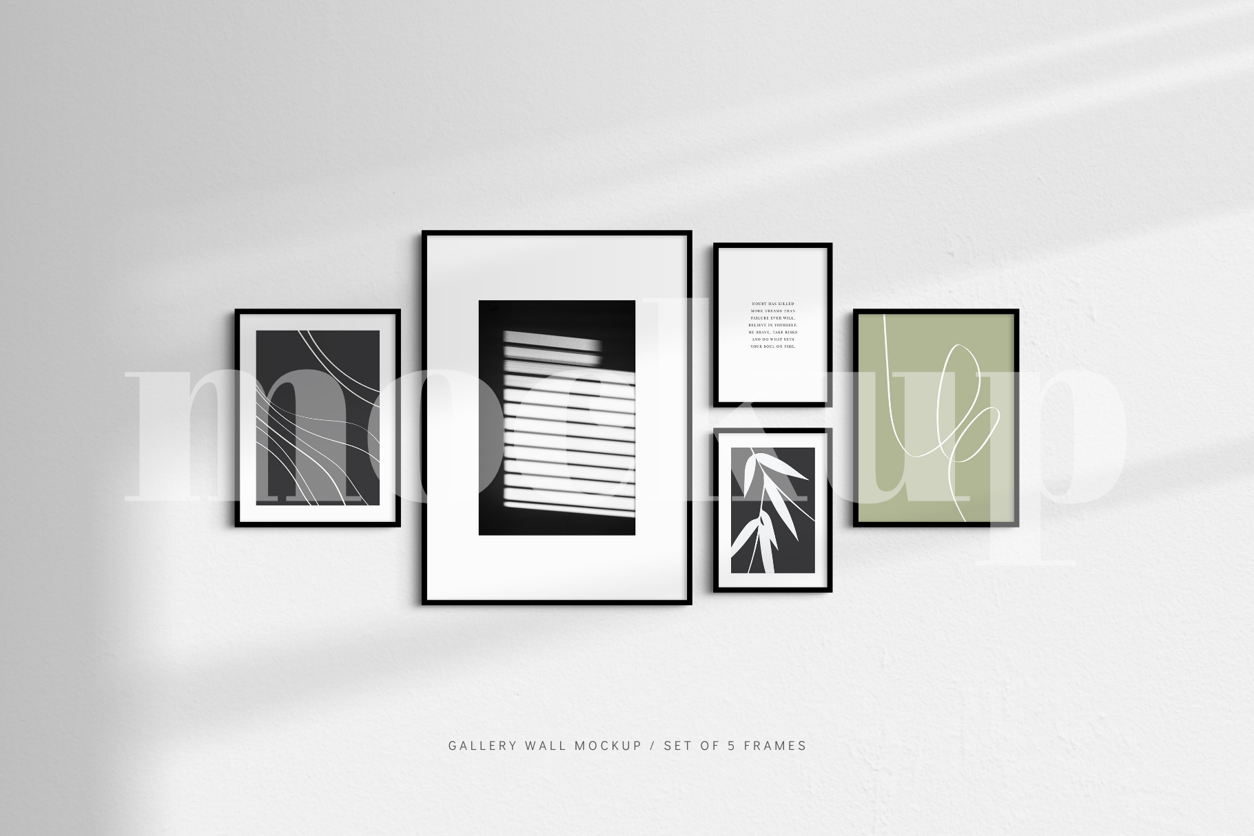 Showcase your artwork in an elegant, modern way with this customizable and easy-to-use minimalist gallery wall frame mockup that features a set of 5 thin black frames.