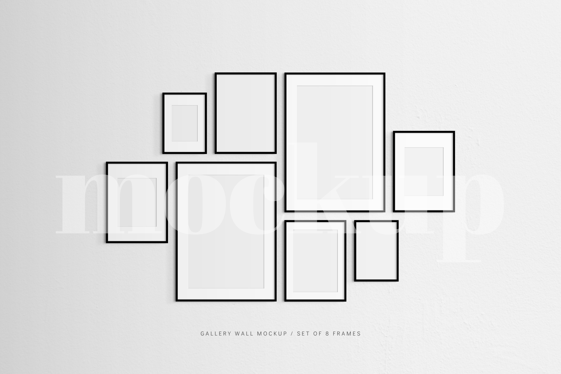 Gallery wall mockup that features a set of 8 thin black frames.